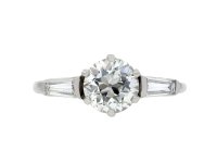 Vintage flanked solitaire diamond ring, American, circa 1950.