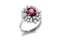 Vintage ruby and diamond cluster ring, circa 1970. 