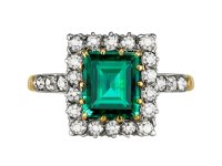 Antique emerald and diamond coronet cluster ring, early 20th Century. 