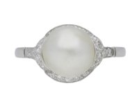 front view Natural pearl and diamond ring, circa 1920.