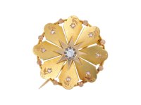 Antique diamond and gold brooch by René Boivin hatton garden