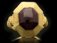 Medieval garnet cabochon ring, circa 1200-1400 century.