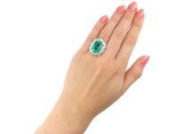 Colombian emerald and diamond cluster ring hatton garden