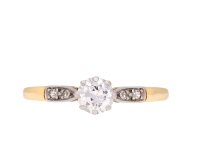 Edwardian diamond flanked solitaire ring, circa 1915. Hatton garden