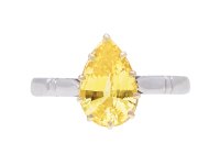 Yellow Ceylon sapphire solitaire ring, circa 1960. Hatton Garden