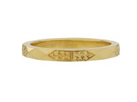 Faceted gold wedding band, English, 1940.