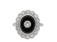 Art Deco onyx and diamond coronet cluster ring, circa 1920. Hatton Garden