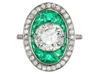 Old mine diamond and emerald cluster ring, circa 1920.