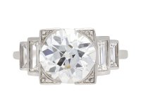 Art Deco diamond flanked solitaire ring, English, circa 1930. Hatton Garden