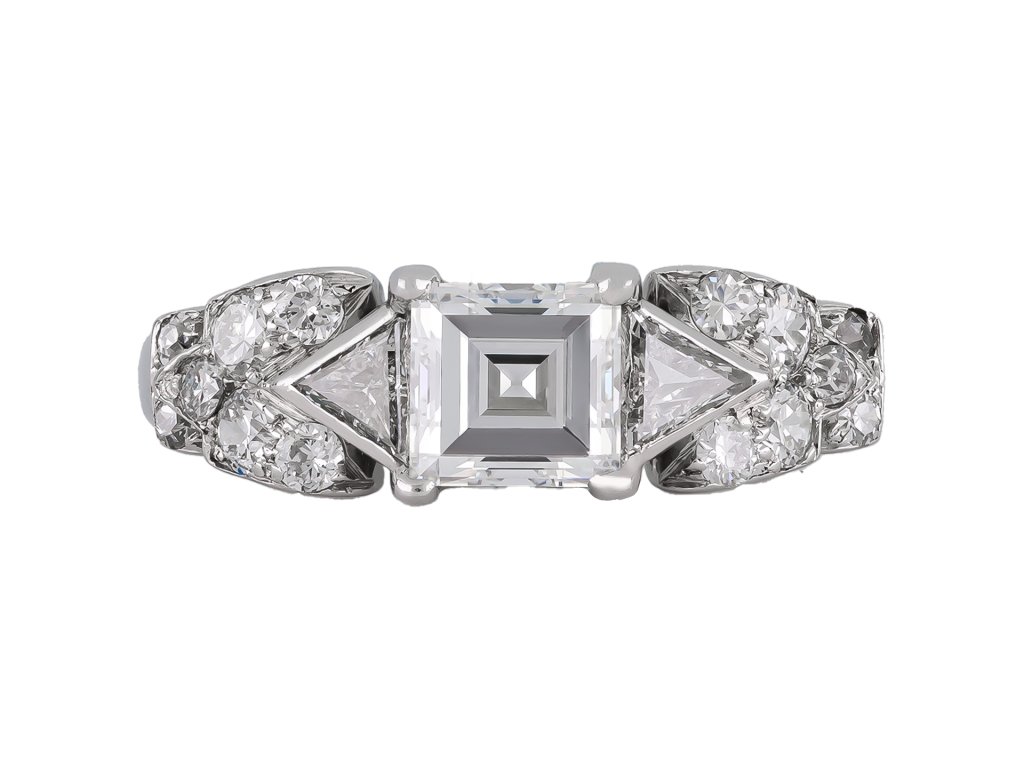 Vintage diamond flanked solitaire ring, circa 1950.