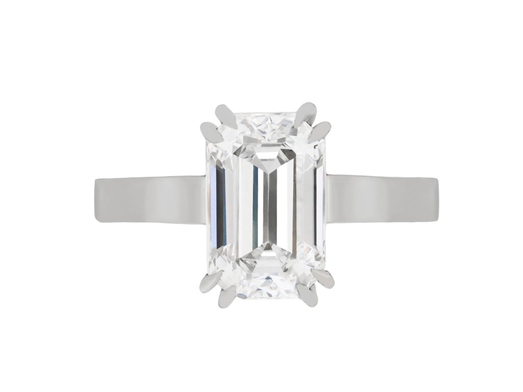 Emerald cut diamond solitaire ring, circa 1970.