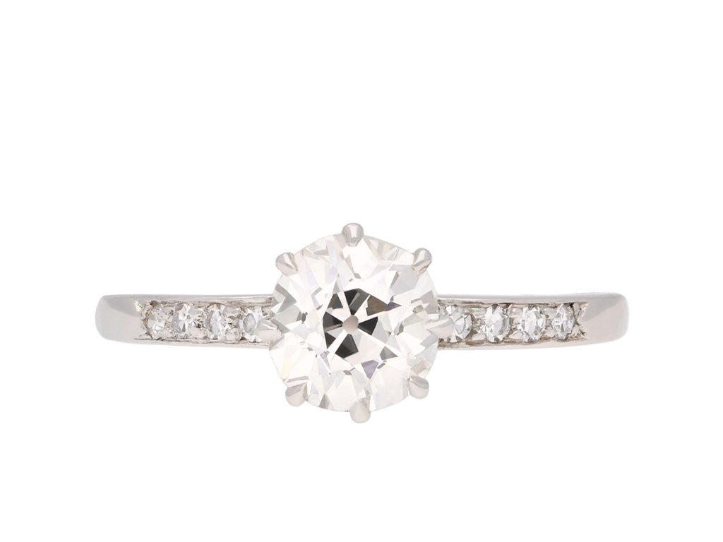 Solitaire old cut diamond ring with diamond set shoulders, circa 1910. Hatton Garden