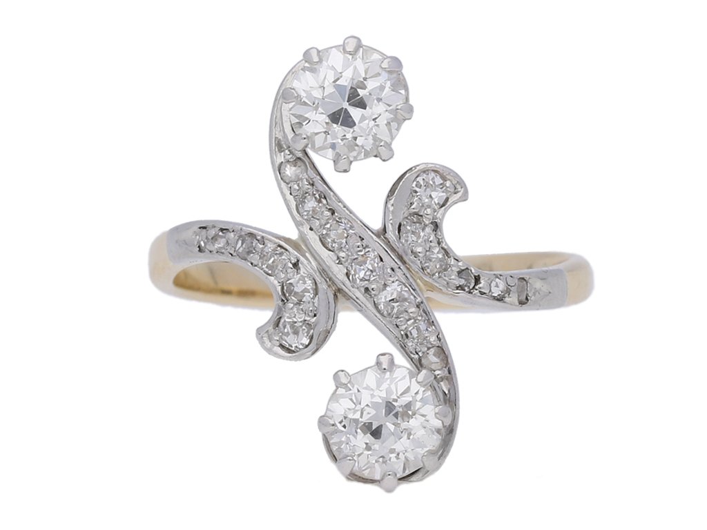 front view Art Nouveau diamond two stone cross over ring, circa 1905.      