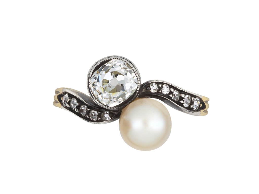 Antique diamond and pearl crossover ring, circa 1890.   