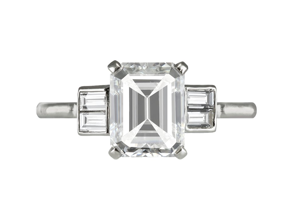 Art Deco diamond flanked solitaire ring, English, circa 1930.
