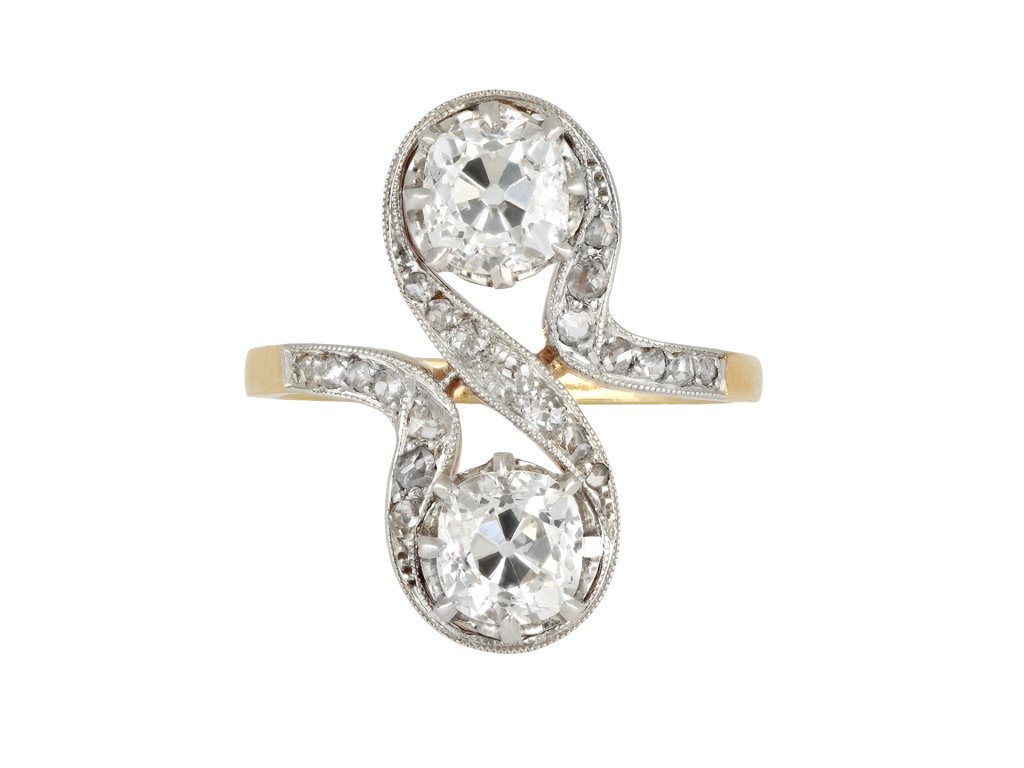 Belle Époque diamond two stone crossover ring, French, circa 1905. 