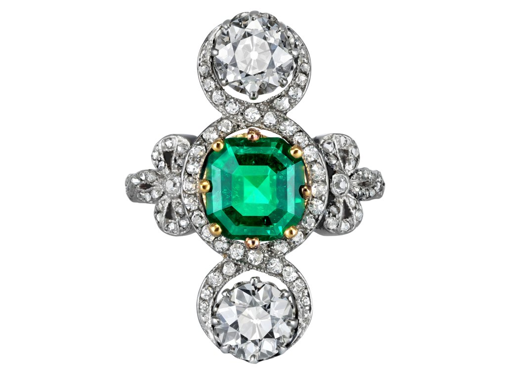 Edwardian Colombian emerald and diamond crossover ring, circa 1915.