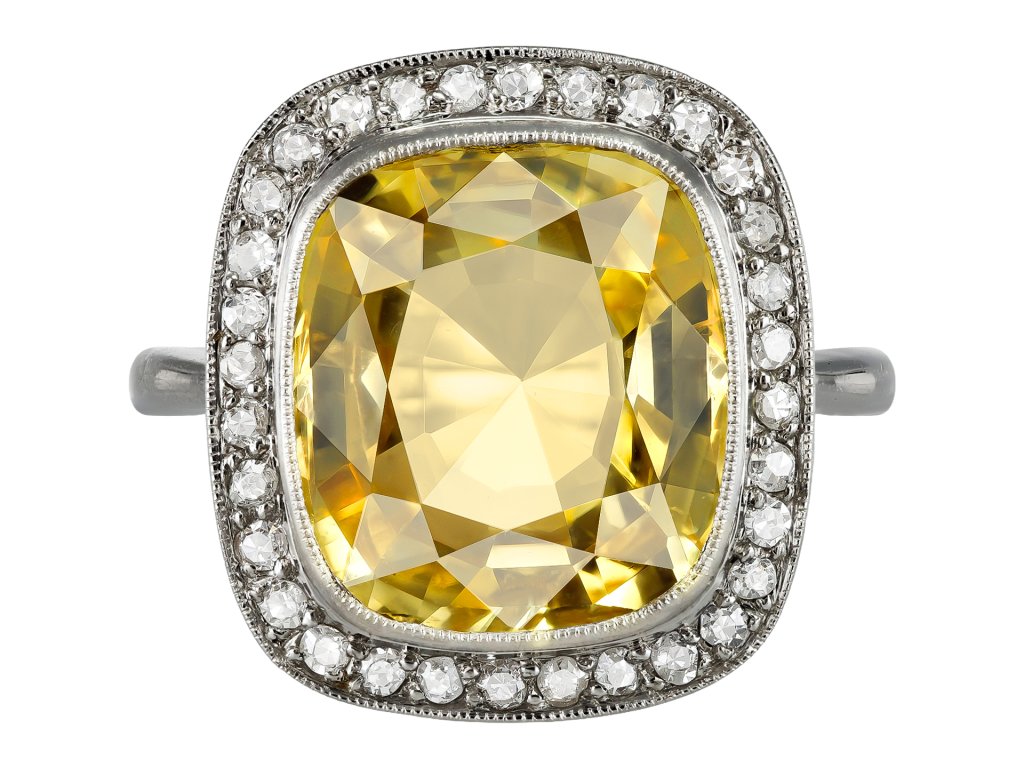 Yellow Ceylon sapphire and diamond coronet cluster ring, circa 1920. 