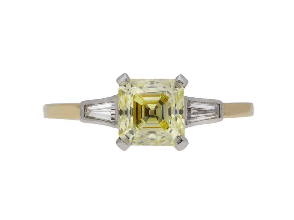 Fancy yellow diamond flank solitaire ring berganza hatton garden