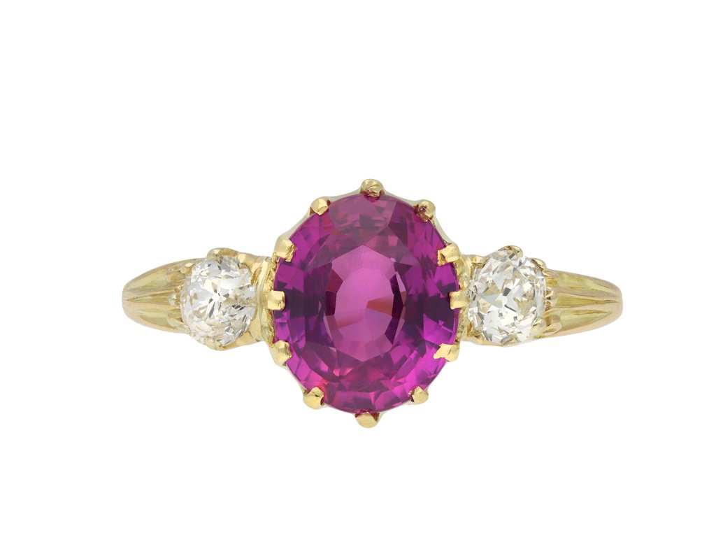 Pink Ceylon sapphire and diamond three stone ring hatton garden