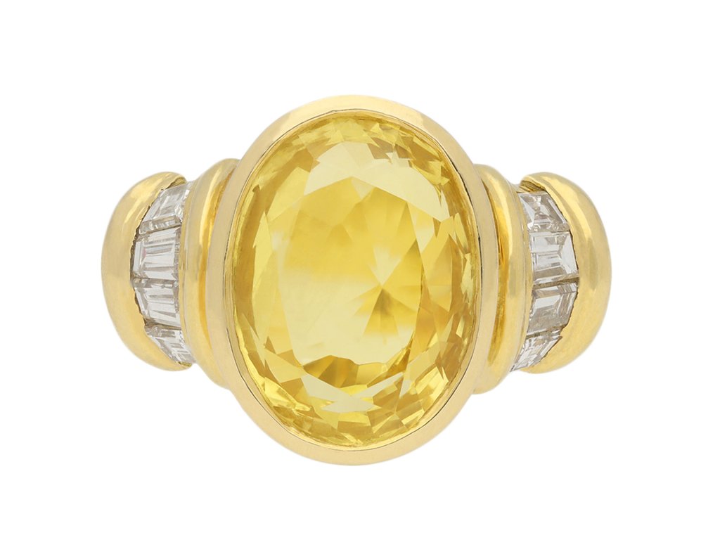 Arthus Bertrand yellow Ceylon sapphire and diamond dress ring, French, circa 1970. Hatton Garden