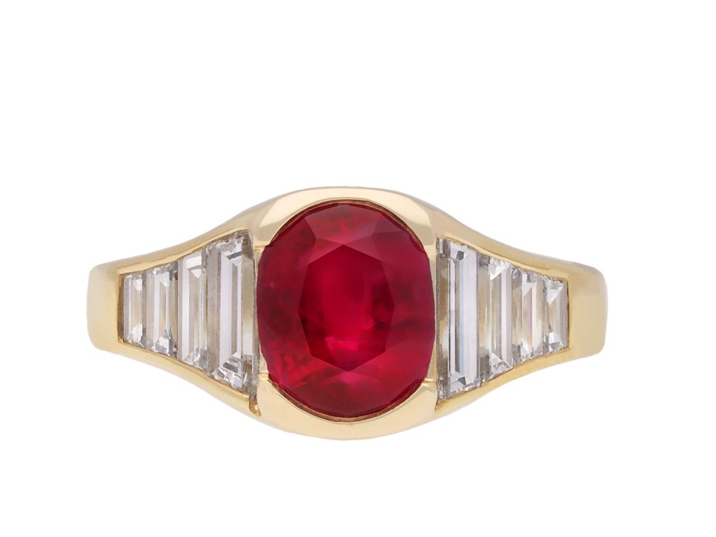 Burmese ruby and diamond flank solitaire ring, circa 1950. Hatton Garden