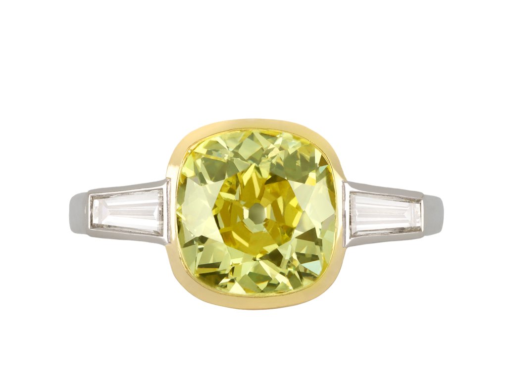 Fancy intense yellow diamond flanked solitaire ring hatton garden