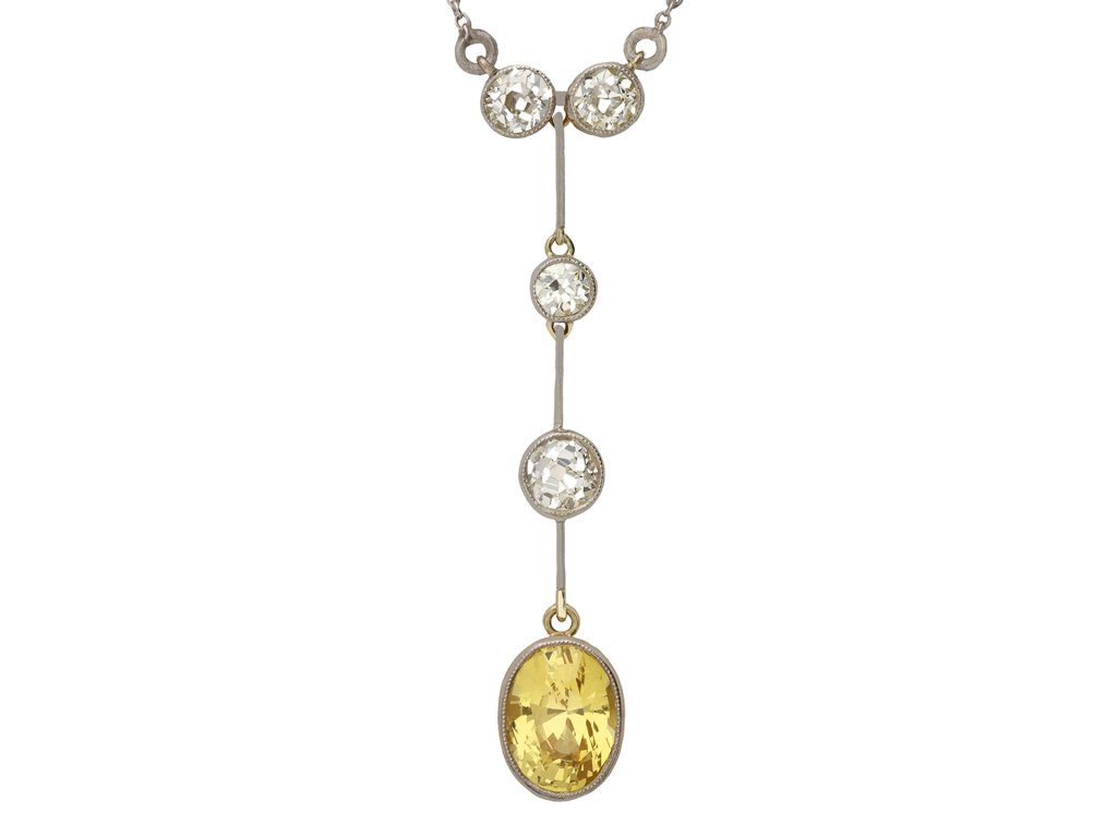 yellow ceylon sapphire and diamond pendant. hatton garden