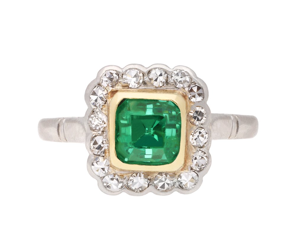 Colombian emerald and diamond coronet cluster ring, circa 1915. Hatton Garden