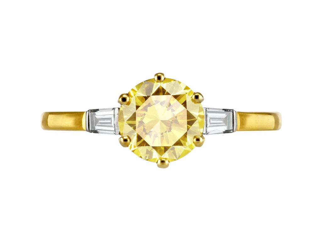 Fancy Intense yellow diamond flank solitaire ring, circa 1950. 