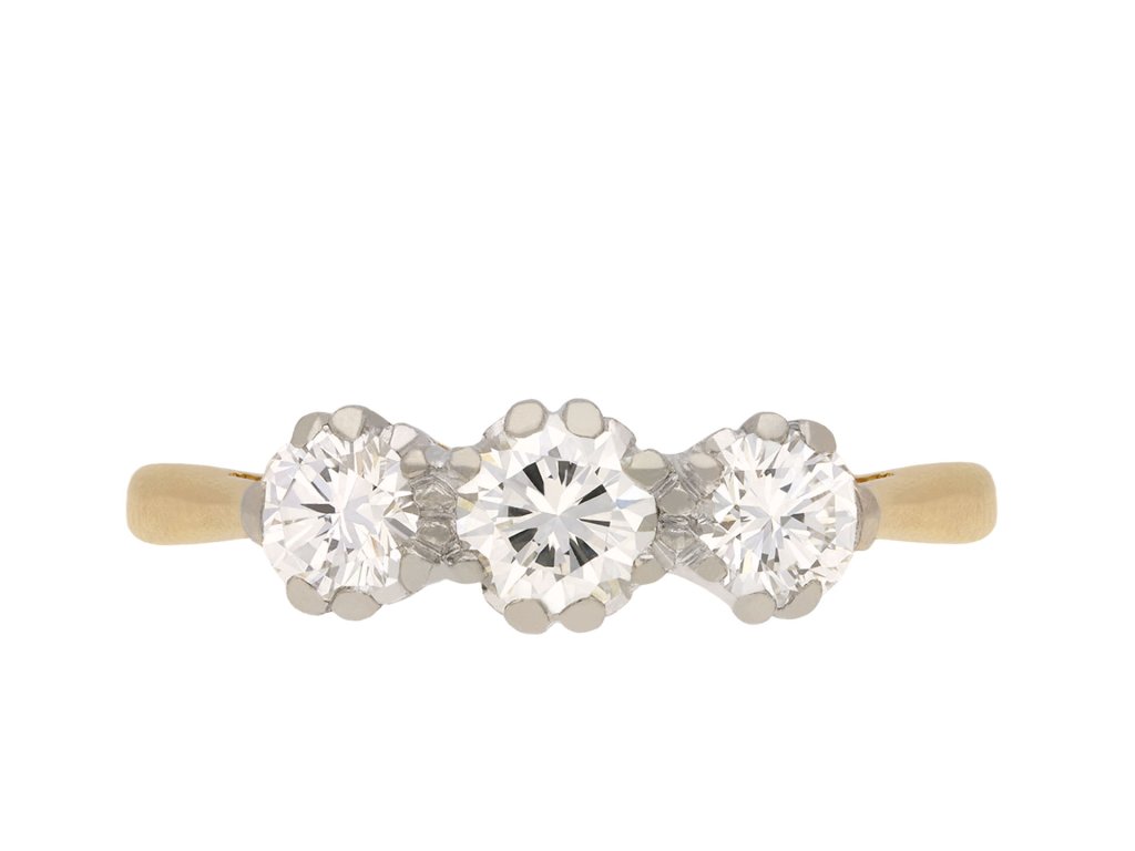 Diamond three stone ring, English, circa 1973. Hatton Garden