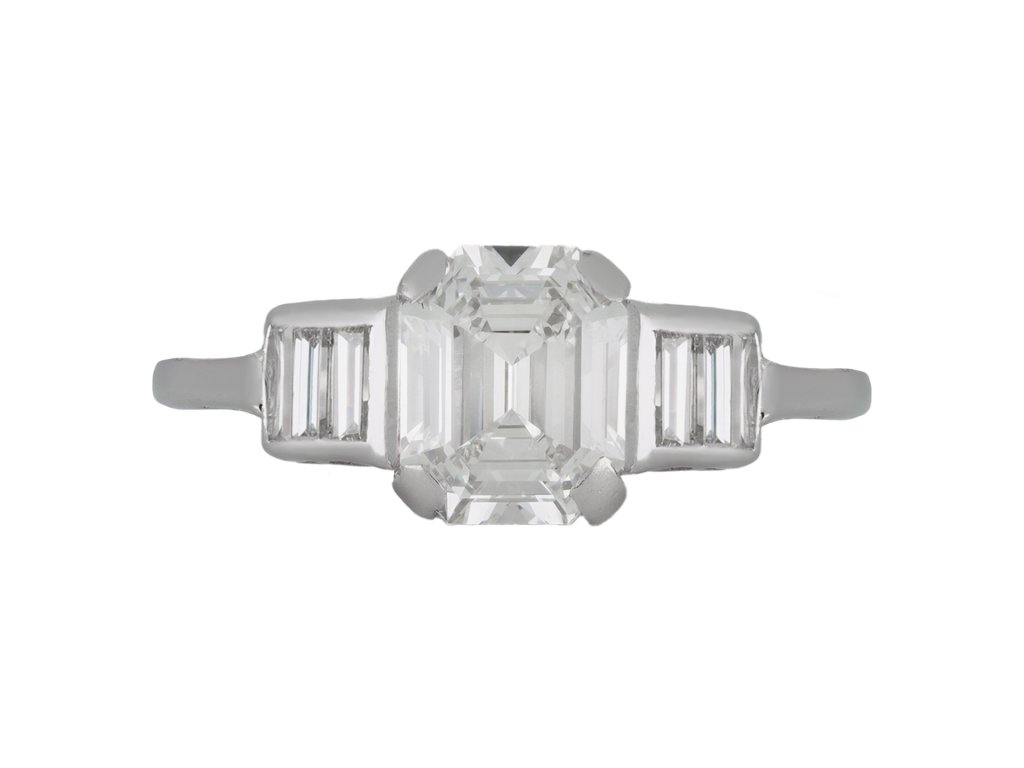 Art Deco diamond flanked solitaire ring, circa 1920.