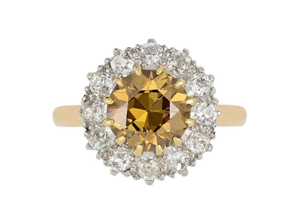 Fancy deep brown yellow diamond cluster ring, English, circa 1910. 