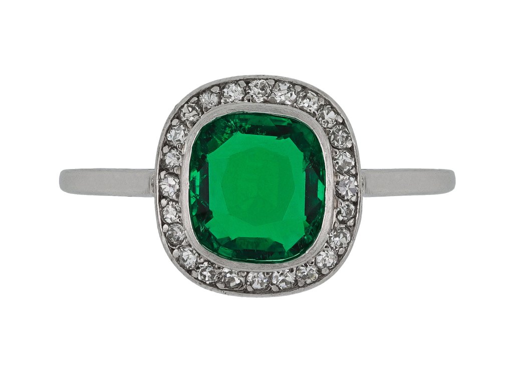 Colombian emerald and diamond coronet cluster ring, French, 1915.
