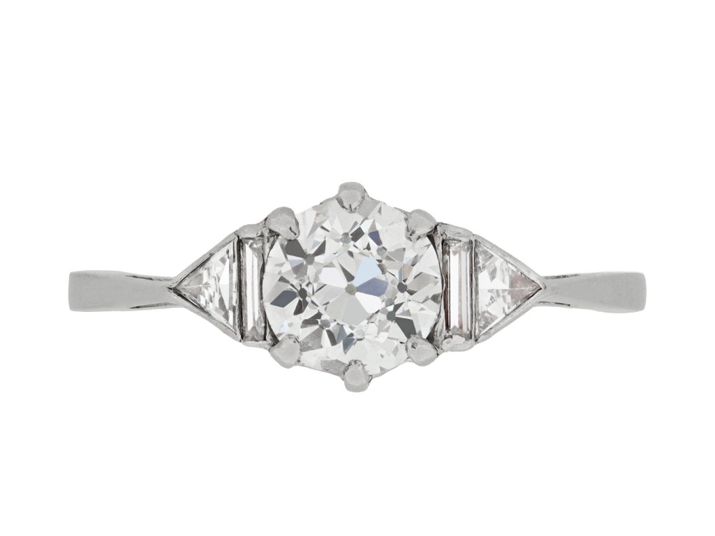 Art Deco diamond flanked solitaire ring, circa 1930. 