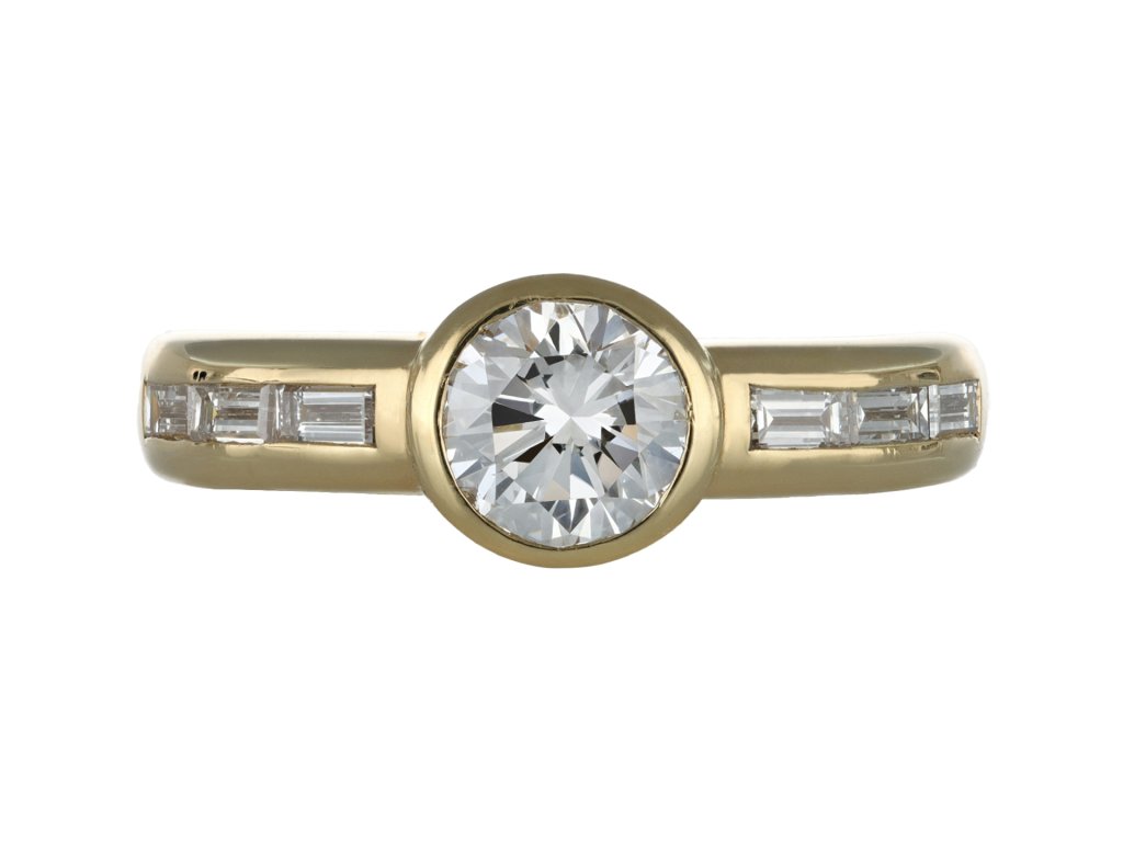 Diamond flanked solitaire ring by Wempe, German, circa 1970.