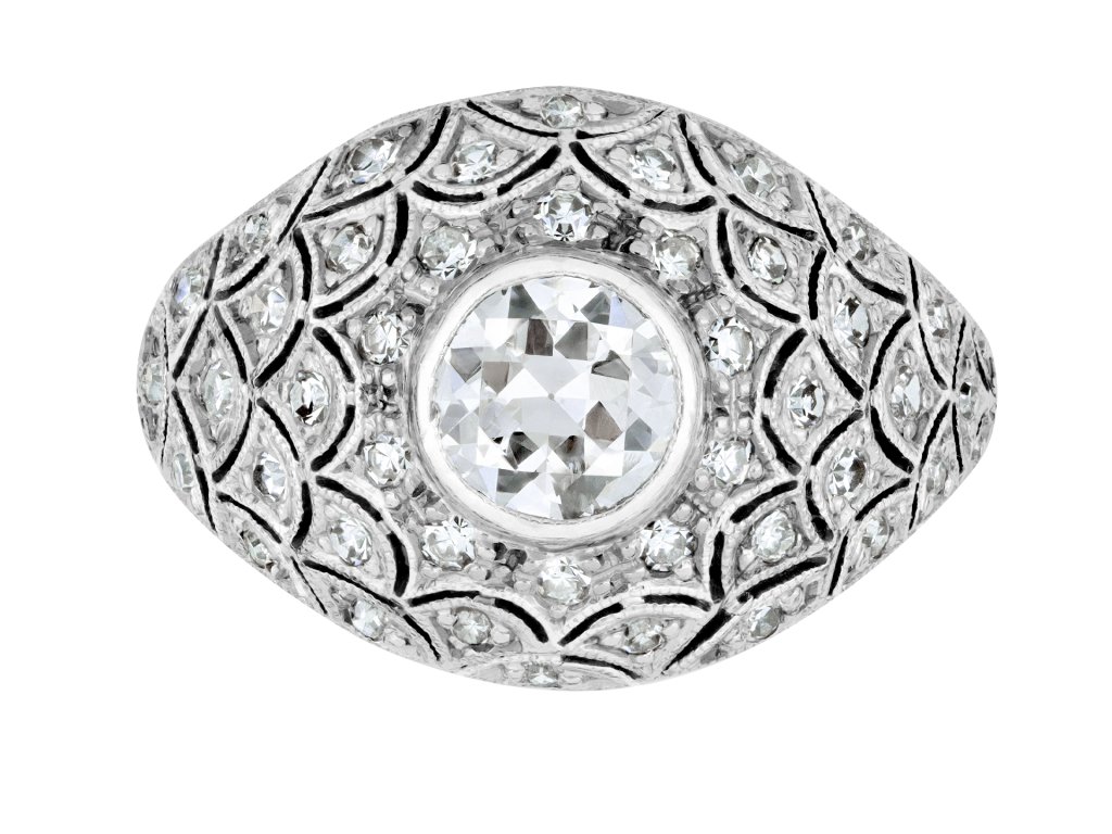 Bombé diamond cluster ring, circa 1930. 