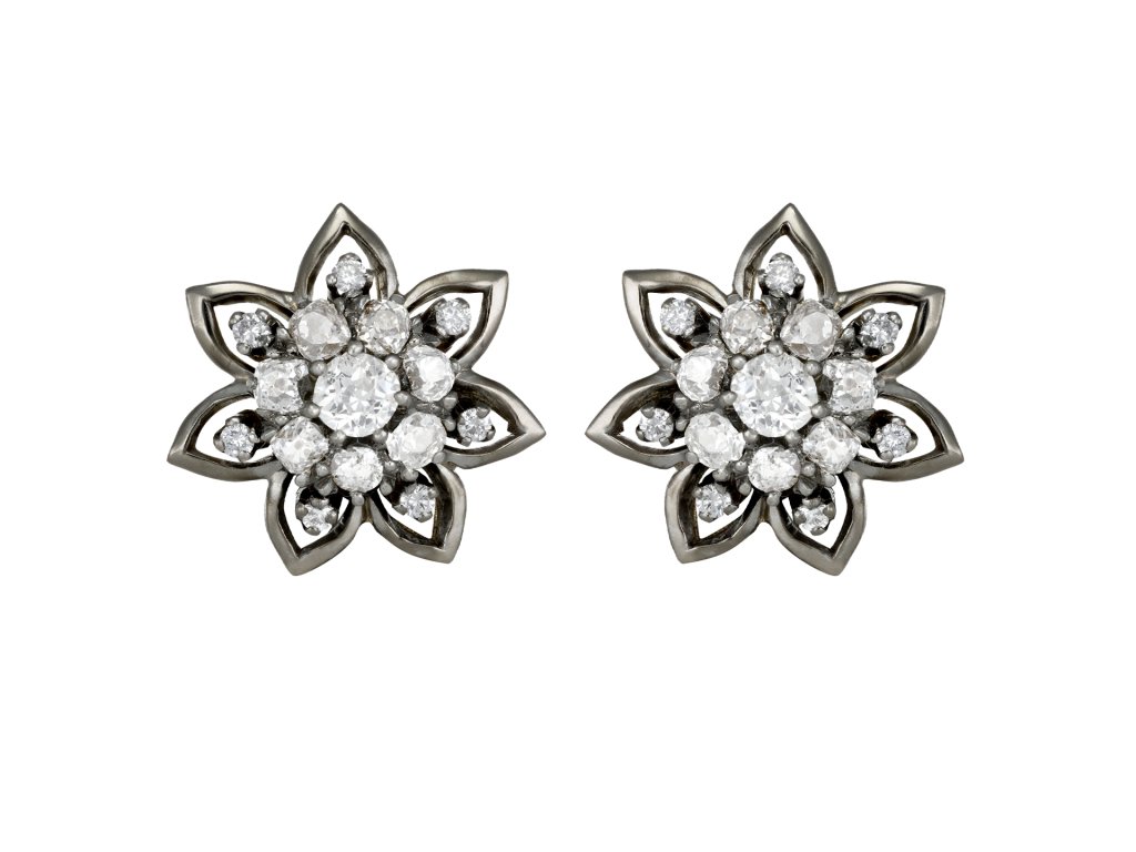 Vintage diamond cluster earrings, circa 1950. 