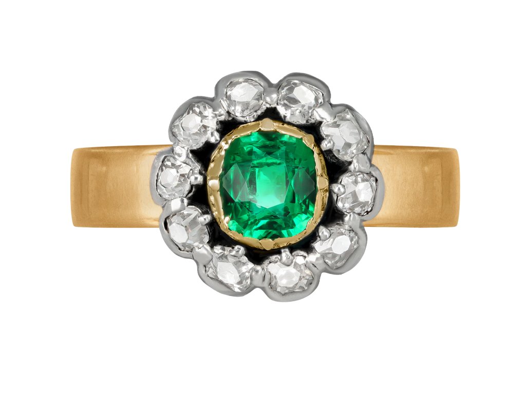 Emerald and diamond coronet cluster ring, circa 1870.