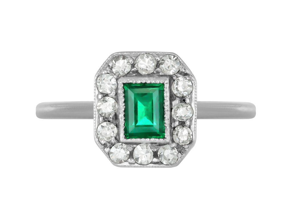 Emerald and diamond cluster ring, circa 1930.