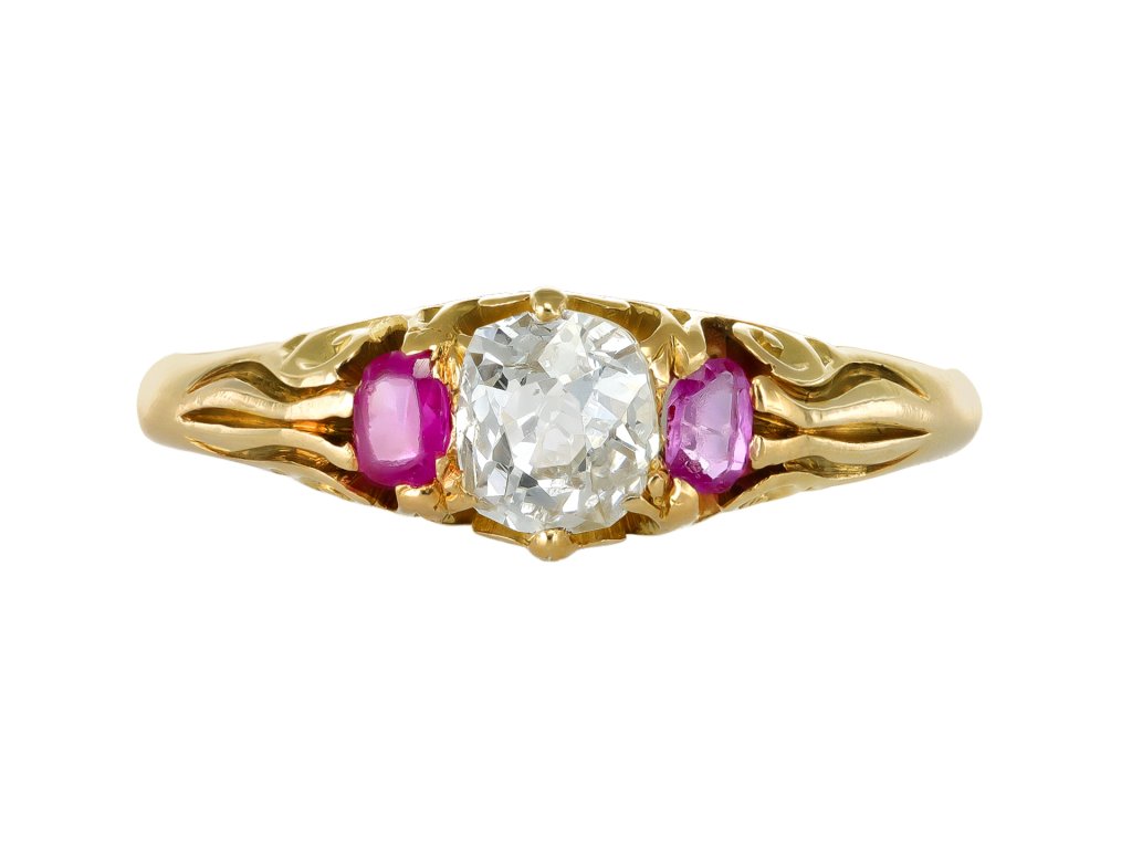 Ruby and diamond three stone ring, English, 1873. 