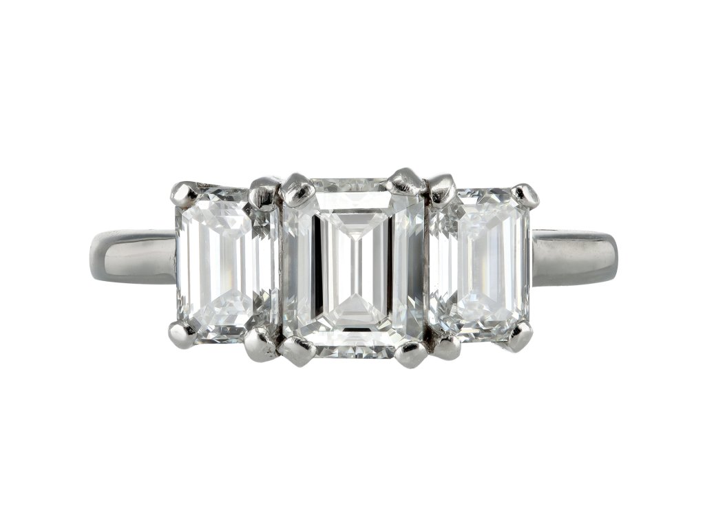 Emerald cut diamond three stone ring.