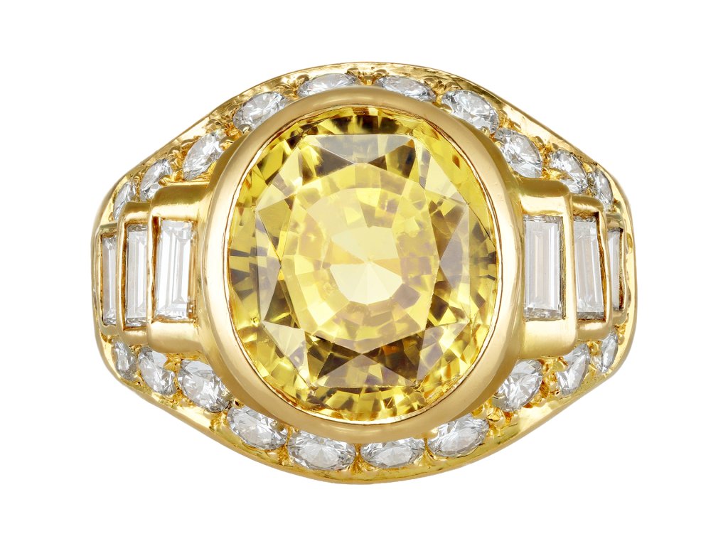Yellow Ceylon sapphire and diamond cluster ring, circa 1970.