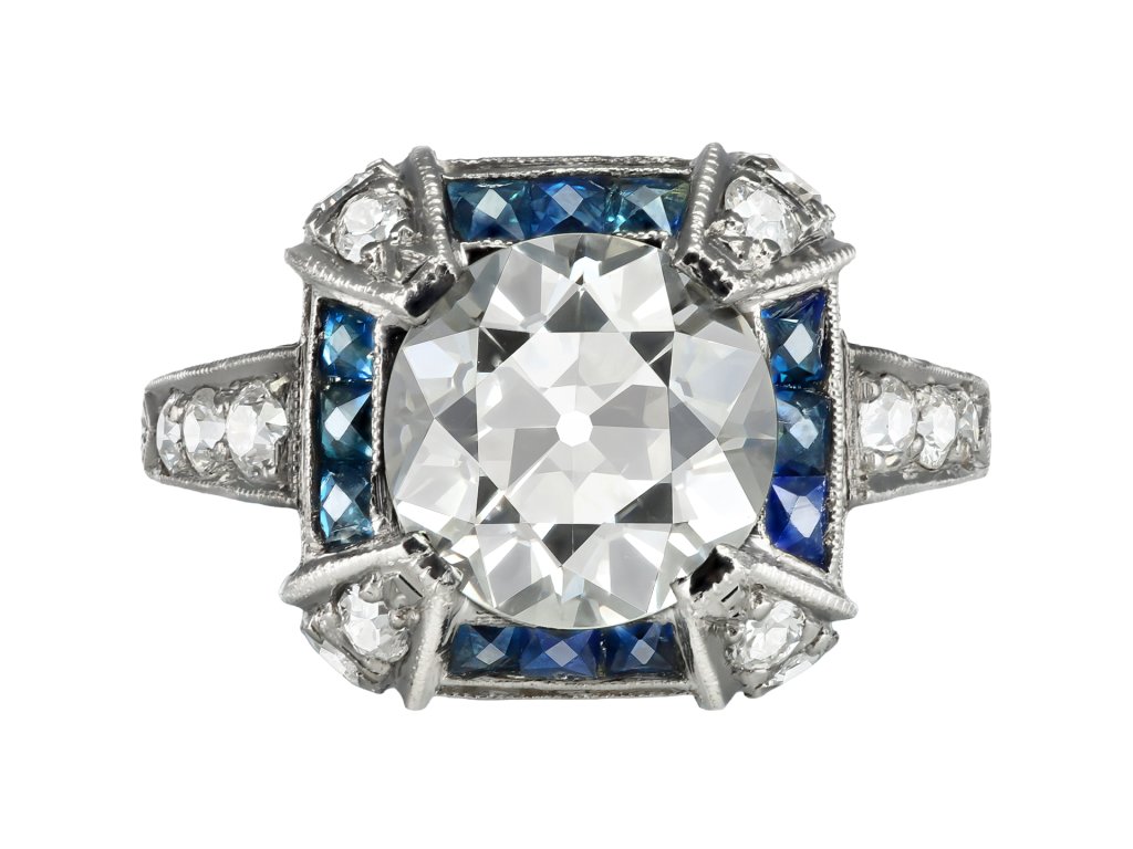 3.13 carat Old cut diamond and sapphire cluster ring, early 20th Century.