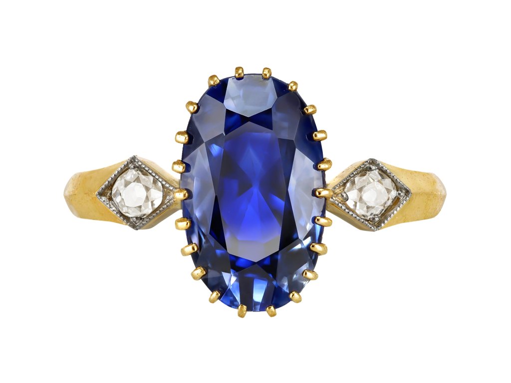 Ceylon sapphire and diamond three stone ring, early 20th century.