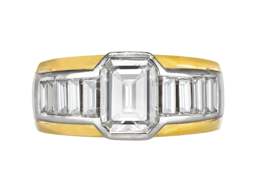 Diamond flanked solitaire ring by Friedrich, German, circa 1990.