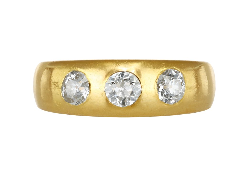 Diamond three stone gypsy ring, circa 1900.