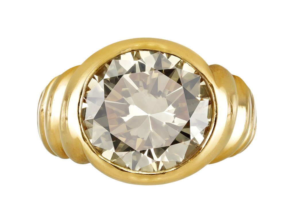 5.37 carat Fancy Deep Brownish Yellow Diamond solitaire.