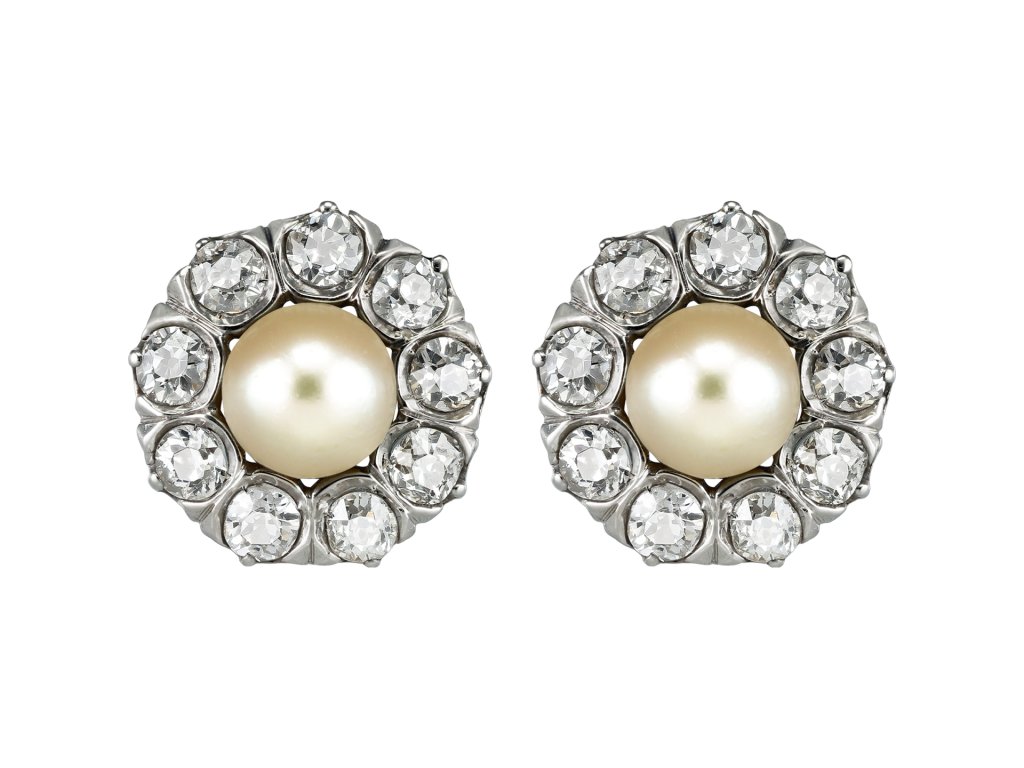 Natural pearl and diamond cluster earrings, circa 1910.