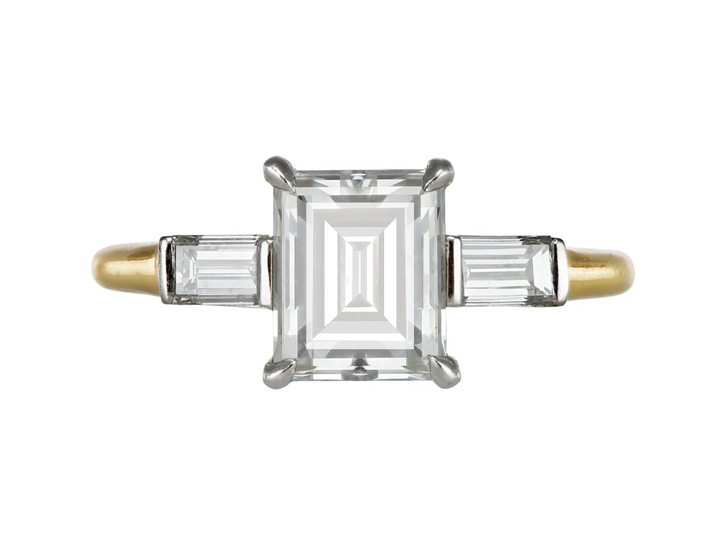 Diamond flanked solitaire, circa 1940. 